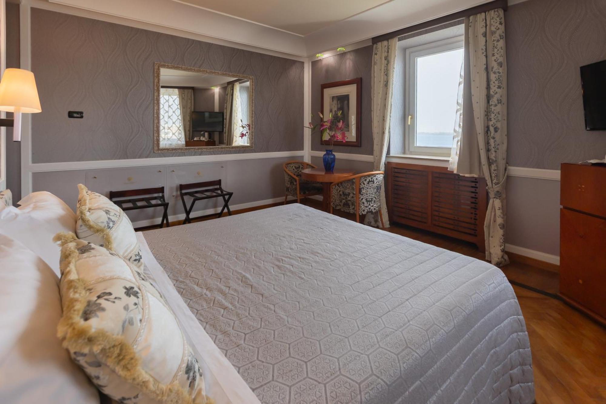 Grand Hotel Ortigia Syracuse Eksteriør bilde A bedroom